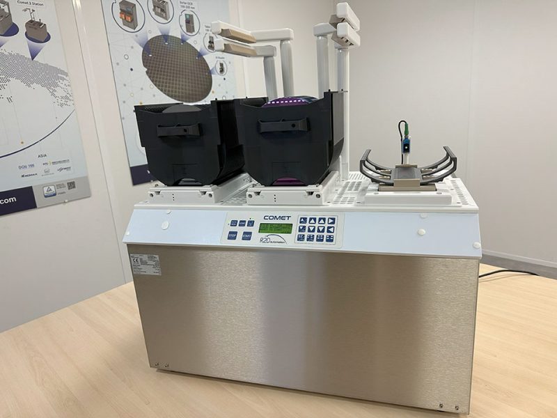 Image of the COMET 3 Station with two wafer carriers on top.